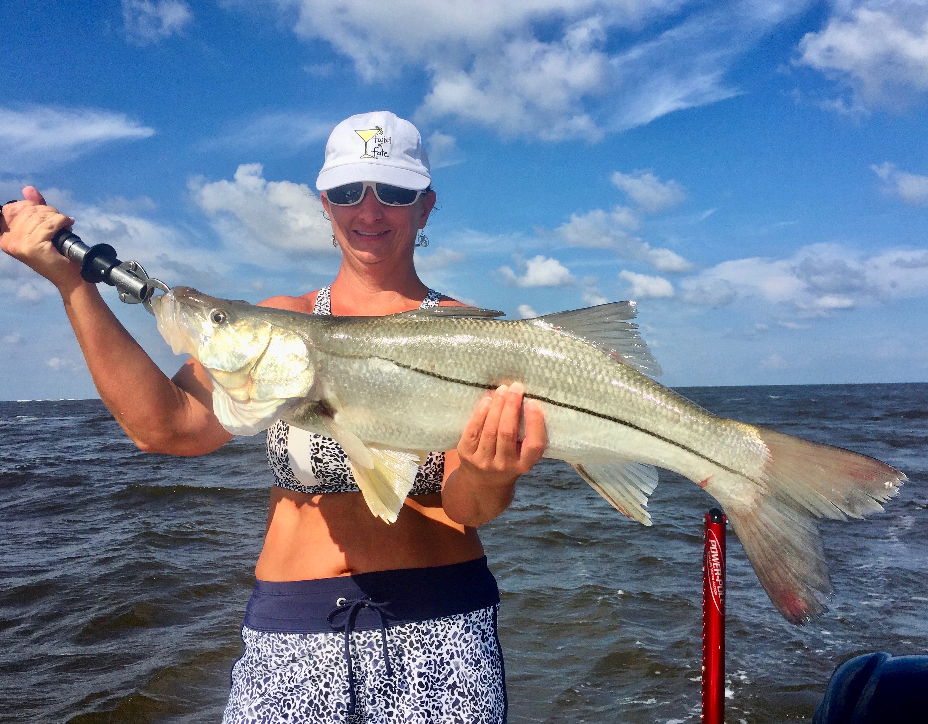 Lady Holding A Snook